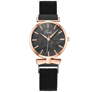 Women's rose gold quartz watch with black Milanese magnetic strap and leaf dial