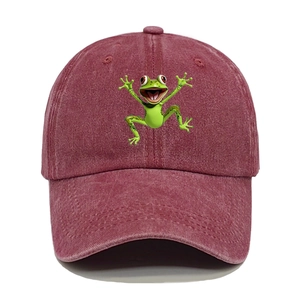 Detail of washed cotton baseball cap with embroidered green cartoon frog graphic