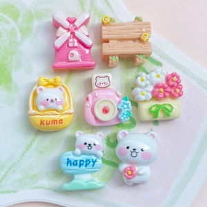 Adorable 7-piece resin miniature set featuring flower bears and a pink camera accessory