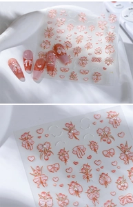 Detailed 5D butterfly nail stickers with 3D embossed heart and floral textures