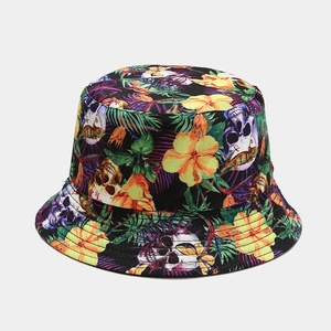 Detail of tropical floral and skull print on a double-sided sun protection bucket hat