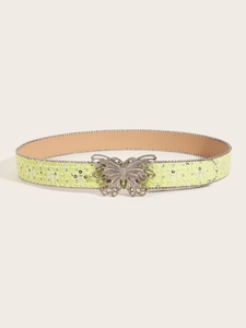 Close-up of fluorescent yellow sequin belt with silver hollow butterfly buckle and chain trim