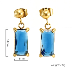 Detail view of 18K gold plated earring with blue zircon and size specifications