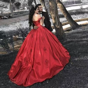 Elegant red off-shoulder ball gown wedding dress with lace floral embroidery detailing