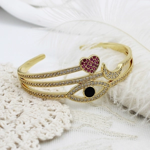 Triple-layer gold-plated bracelet with evil eye, pink heart, and moon zircon charms