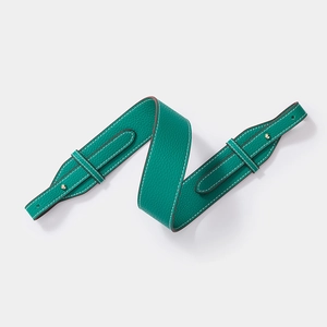 Litchi pattern green leather shoulder strap with white stitching and gold hardware