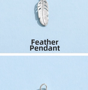 Macro detail of 925 sterling silver feather pendant showing fine texture and loop