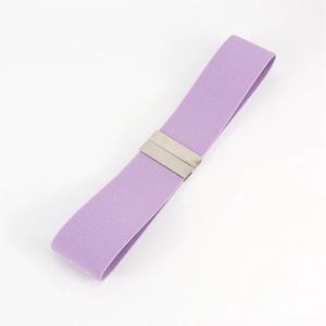 Detailed view of purple elastic waist belt with silver metal buckle and dense fabric texture