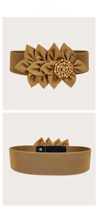Elastic wide belt detail featuring floral petals with pearl center and snap button closure