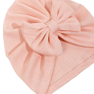Bonnet turban rose pour bébé avec grand nœud et maille gaufrée respirante pour nouveau-né