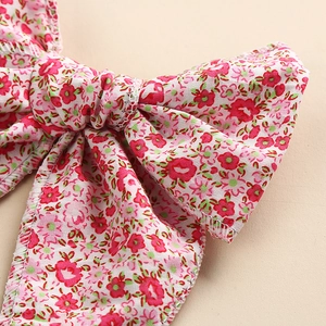 Pink floral cotton bow hair clip for girls, handmade hair accessory with spring print design