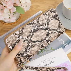 Elegant faux snakeskin long wallet with metal zipper and wrist strap for women