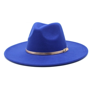 Close-up of a navy wool fedora hat featuring a shiny gold metallic band and buckle