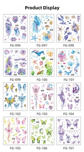 Detailed grid of 12 colorful glitter butterfly and marine animal temporary tattoo stickers
