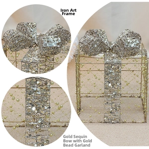 Detail of iron frame structure with golden sequin bow and decorative bead strings
