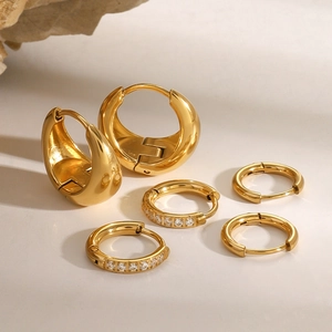 Three pairs of 18K gold plated stainless steel hoop earrings with crystal pavé accents