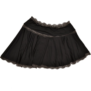 Detailed close-up of a black satin skirt with intricate dark floral lace trim details