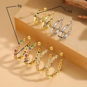 Luxury 14K gold and silver hoop earrings with textured finish and colorful zircon stones