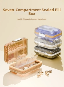 Detailed view of 7-compartment weekly pill organizers with secure metallic buckles