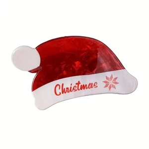 Cute Christmas hat hair claw clip in red and white resin with festive patterns