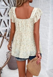 Back view of a white floral square neck top with ruffled sleeves and open back design