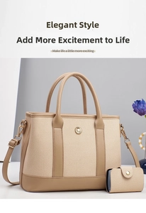 Detail view of beige and khaki tote bag with textured fabric and sunflower metal buckle