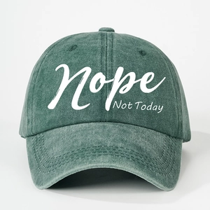 Vintage washed green baseball cap with white Nope Not Today embroidery on white background