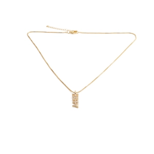 Detail of gold-plated necklace with sparkling zircon encrusted HAPPY letter pendant