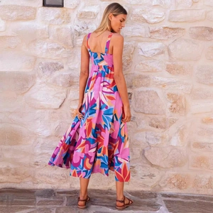 Back view of a summer maxi dress with floral print and adjustable spaghetti straps