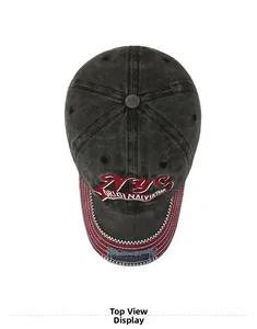 Top view of vintage washed canvas baseball cap with NYC embroidery and distressed red brim