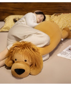 Close-up of cute lion plush pillow with soft texture in a cozy home bedroom setting
