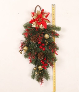 Detailed view of a 50cm Christmas door teardrop with red and gold ornaments and tape measure