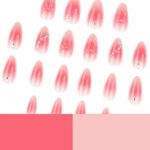 Pink ombre almond press-on nails with 3D relief bows, pearls and heart accents