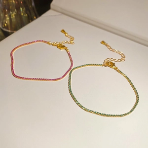 Elegant adjustable bracelets with pink and green square zircons on polished gold chains