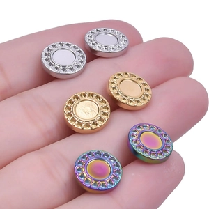 Three pairs of magnetic stainless steel stud earrings in silver, gold, and multicolor