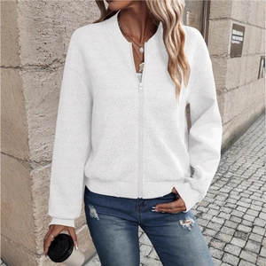 Women's white textured zip-up jacket with long sleeves for a casual outdoor autumn look