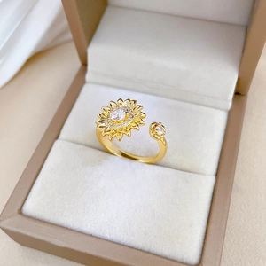 Luxurious gold sunflower ring with sparkling crystals and adjustable open band design
