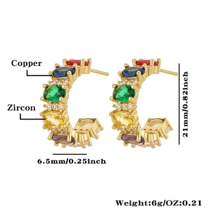 Detail shot of gold C-shaped copper earrings with colorful zircons and size annotations