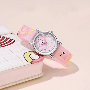 Pink cartoon flamingo kids watch with translucent silicone strap on decorative notebook