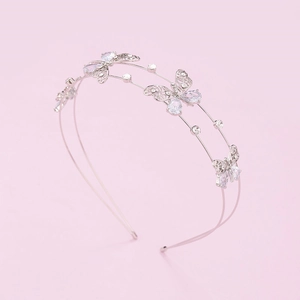 Silver double-layer headband with sparkling zircon butterfly ornaments on pink background