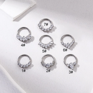 G23 titanium septum clickers with cubic zirconia in seven diverse designs and shapes