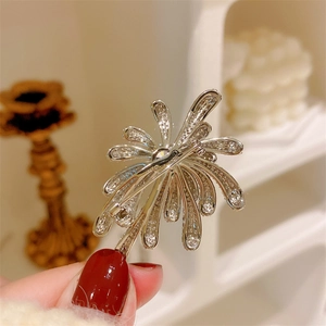Elegant sparkling fireworks brooch with premium zircon crystals and silver metal finish