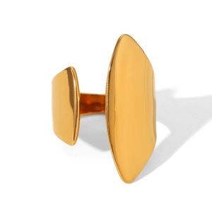 Close-up of wide gold polished geometric open ring with smooth metallic finish