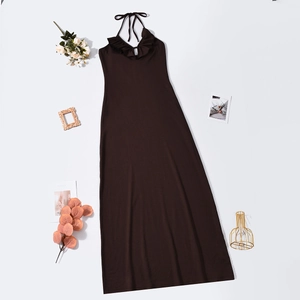 Detail view of dark brown halter maxi dress with ruffle V-neck and wave lace trim finish