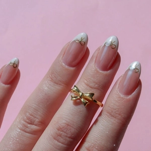 Elegant 18K gold-plated bow ring for women featuring a minimalist hand-painted design