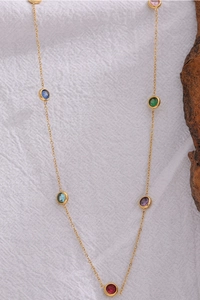 Exquisite golden stainless steel necklace featuring vibrant multi-colored bezel-set gemstones