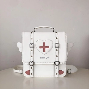 Detail of white Lolita style backpack with Sweet Girl heart patch and wing decoration