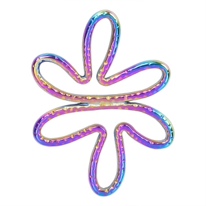 Macro detail of a 18k plated colorful flower charm made of durable stainless steel