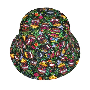 Reversible bucket hat with colorful Hawaiian Tiki mask print and tropical floral pattern