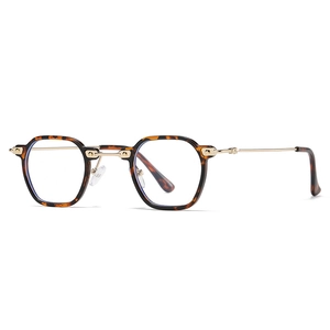 Retro small square tortoise shell sunglasses with gold metal temples on white background